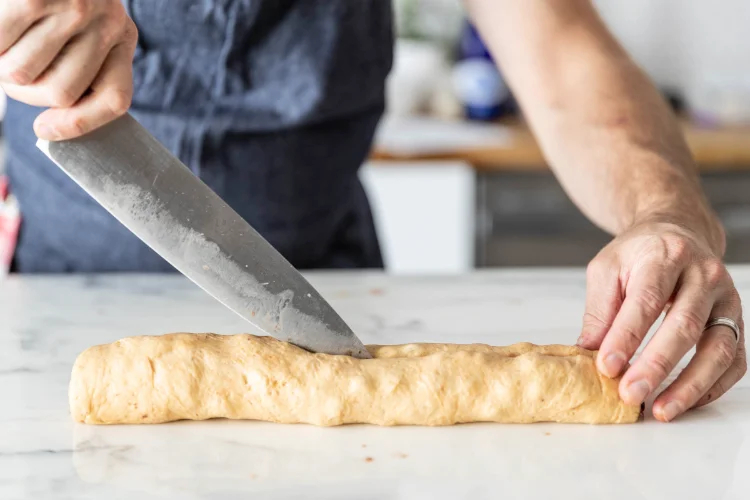 Image of Cut the log lengthwise in half.